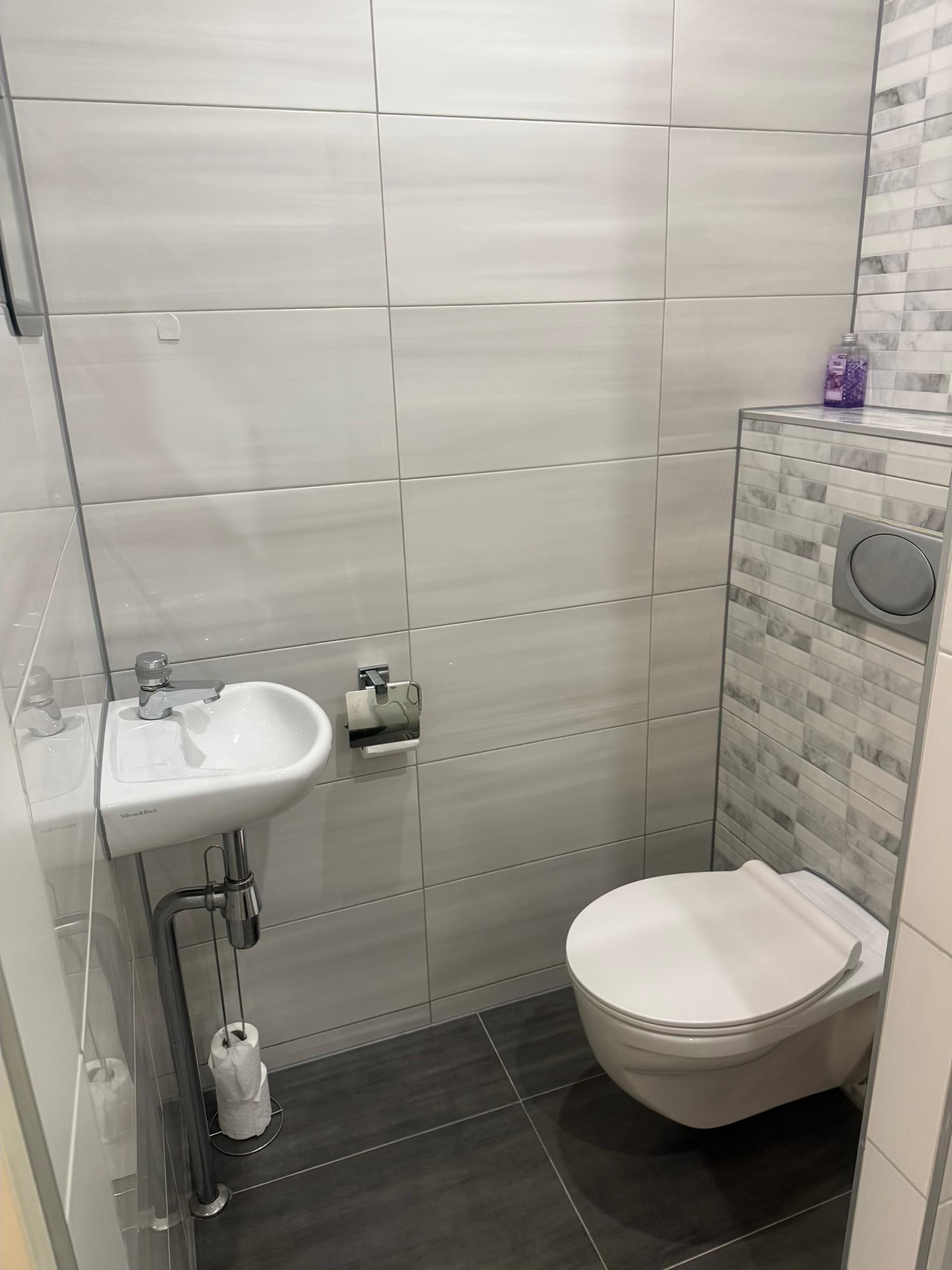 show all photos of Slinge